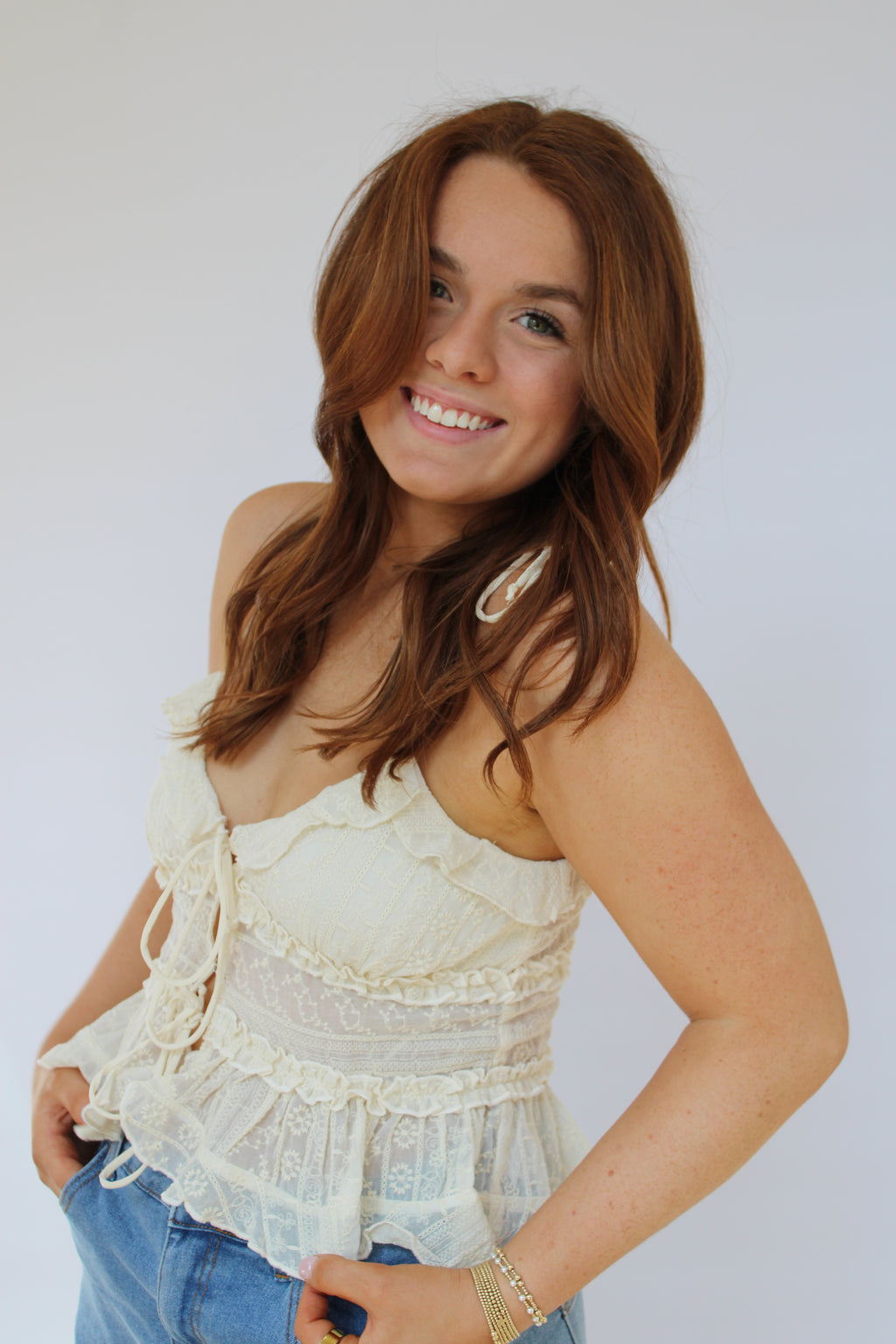 IVORY FLORAL TIE STRAP RUFFLE TIERED CROP TOP